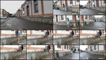 Sexy Brunette Walks Around The Corner And Pees