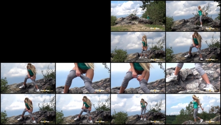 Laura Pisses On Peak Of A Hill